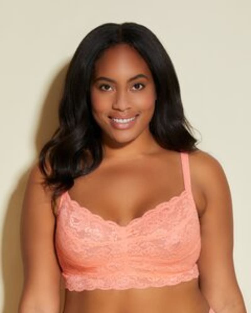 Front of a model wearing a size 1X Sweetie Lace Bralette in Coral Breeze by Cosabella. | dia_product_style_image_id:253648
